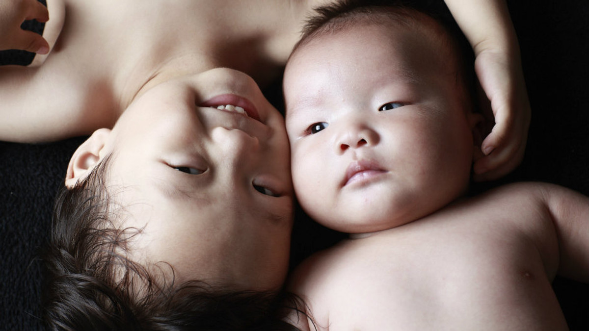 Китайським сім'ям дозволили мати по дві дитини - фото 1